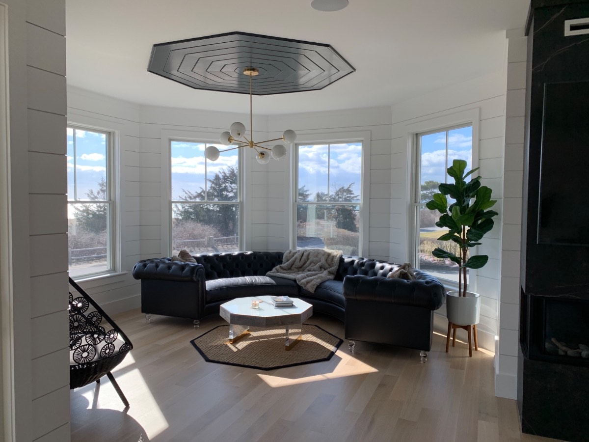 Custom octagonal coffered ceiling in a Cape Cod living room with ocean views