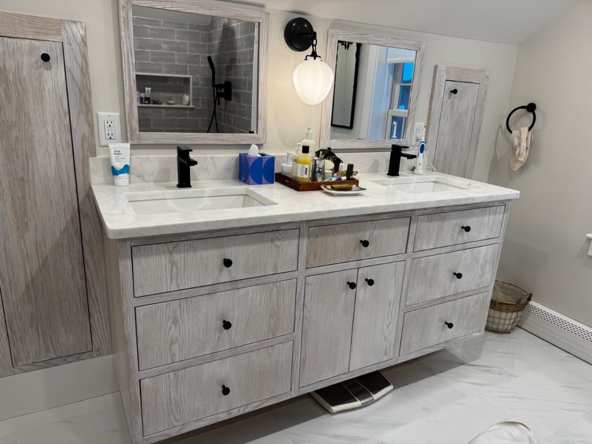 Custom gray-wash double vanity with marble top