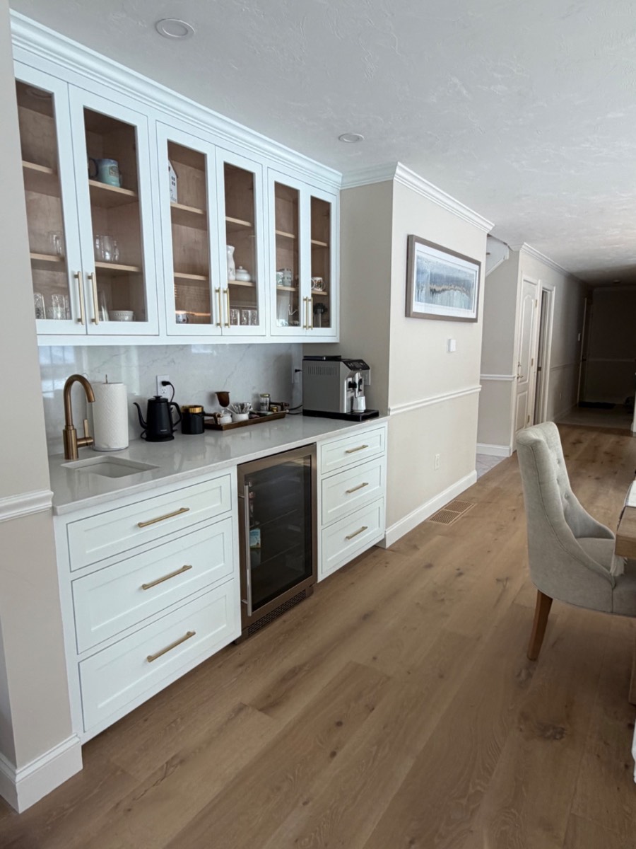 Custom white coffee bar hutch with brass hardware